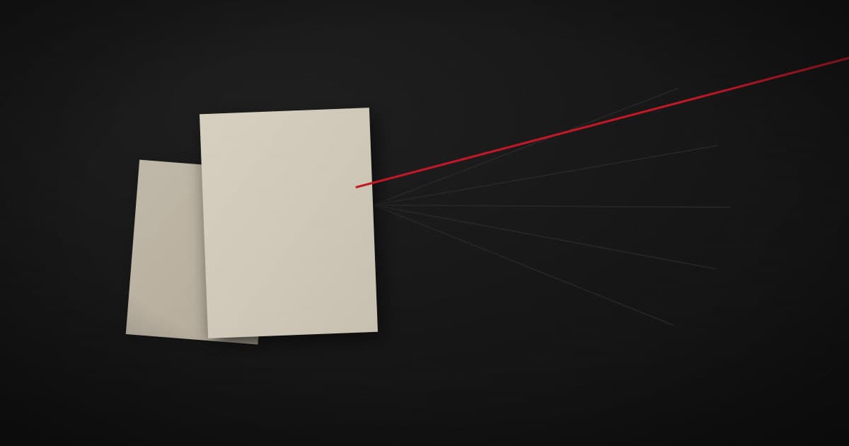 Two pale sheets of paper alone on a wide dark surface, faint threads fanning away from them and one crimson thread running off the edge of the frame